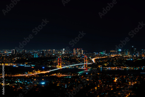 View of all Istanbul and the 15 July Martyrs Bridge in night lights.