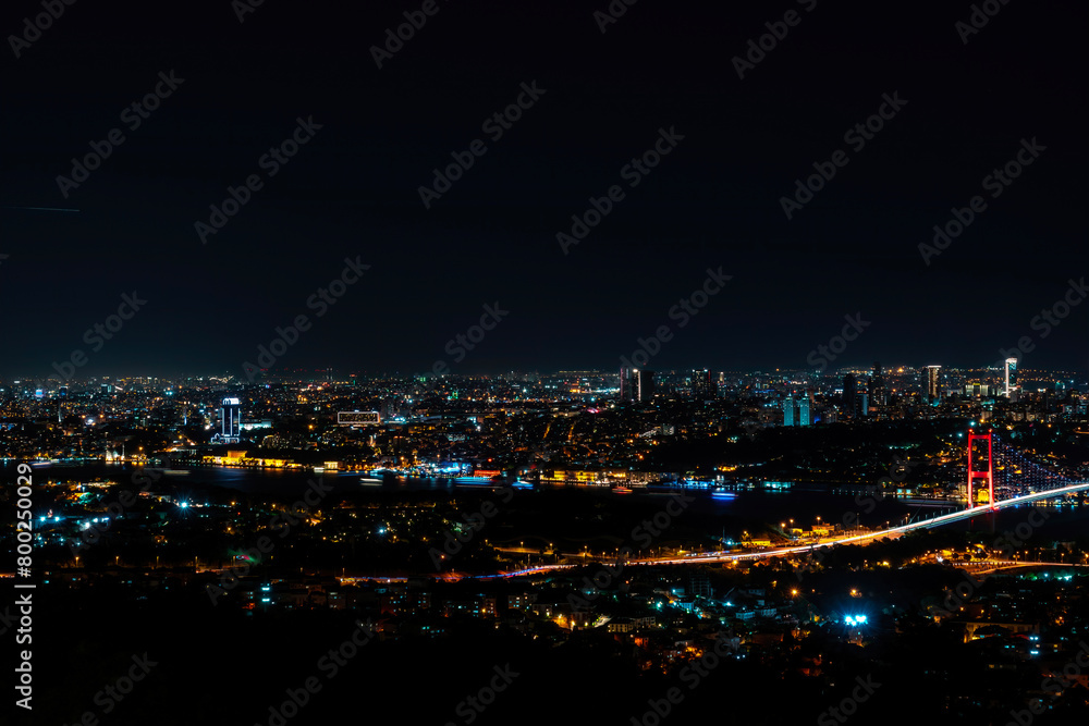 View of all Istanbul and the 15 July Martyrs Bridge in night lights.