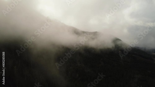 Aerial View Of Misty Cloudy Mountainous Dark Forest, Olympic Peninsula, Washington USA photo