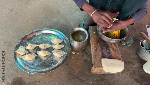 Unhygienic samosas being prepare in rural villages of India. no face.