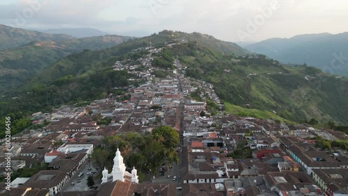 Flying over the picturesque andean town of Salamina located on a mountain ridge in the Caldas department in Colombia photo