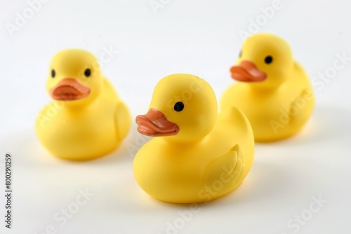 Rubber duck toy in yellow color on white backdrop