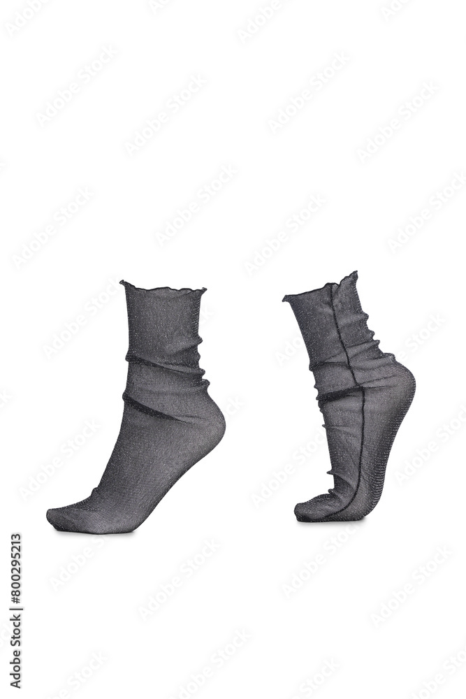 Close-up shot of a pair of transparent kapron socks with lurex without elastic. Thin socks are isolated on a white background. Side view. Close-up shot of a pair of transparent kapron socks with lurex without elastic. Thin socks are isolated on a white background. Side view.