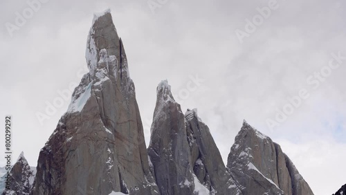 Close view of Cerro Torre, Torre Egger and Cerro Standhardt  with fast moving clouds . Extreme weather conditions. Patagonia, Argentina photo