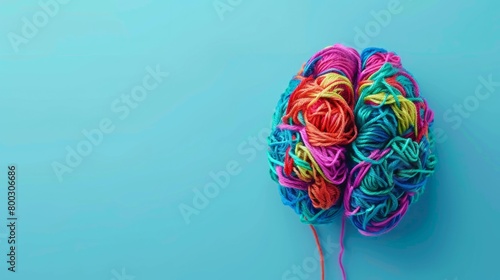 Human brain made of multi-colored tangled threads generative ai