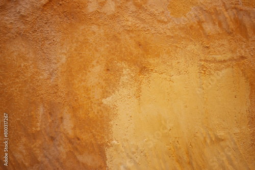 detail of stone and cement wall with peeling paint texture