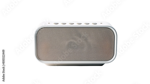 A white radio rests peacefully on a wooden table, radiating a sense of stillness and simplicity