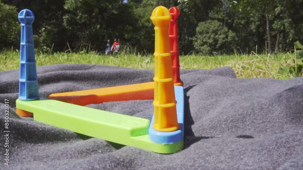 Outdoor throwing rings in summer, slow motion. Outdoor throwing rings in summer, slow motion.