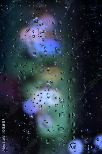 rain drops on window. Rain drops and lights. wet glass window. rain background. rain season.  rain drops pattern. relax