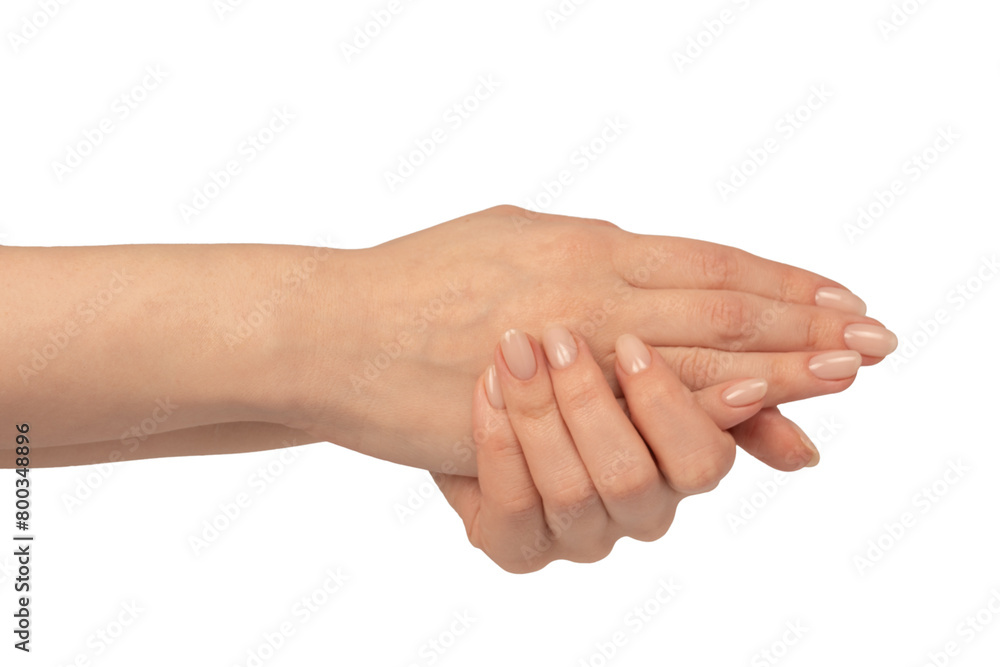 Woman hands isolated on a white background. Nude nail polish. Woman hands isolated on a white background. Nude nail polish.