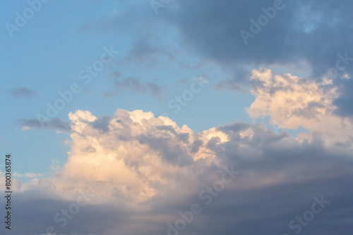 Dramatic sunset clouds in a blue sky, dynamic and inspirational themes