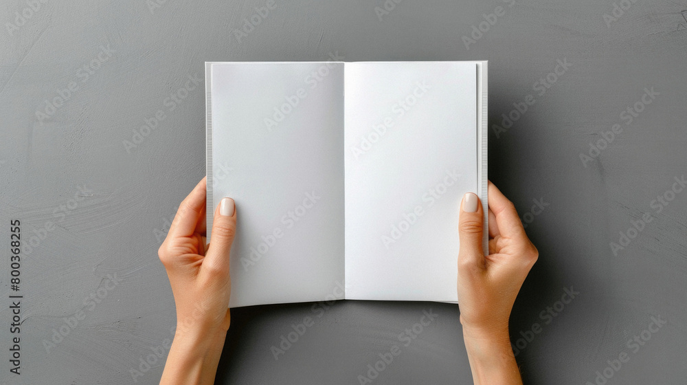 Hands of person holding blank white empty paper mock up. Man or woman presenting mockup paper page sheet, book or letter, card for advertising copy space concept. Close up view. Hands of person holding blank white empty paper mock up. Man or woman presenting mockup paper page sheet, book or letter, card for advertising copy space concept. Close up view.
