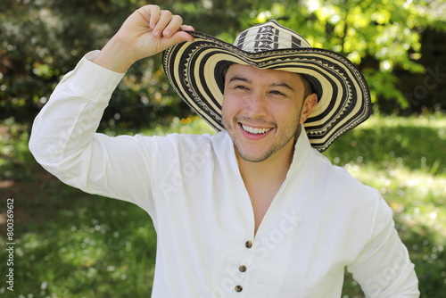 Handsome Hispanic man wearing a hat  photo