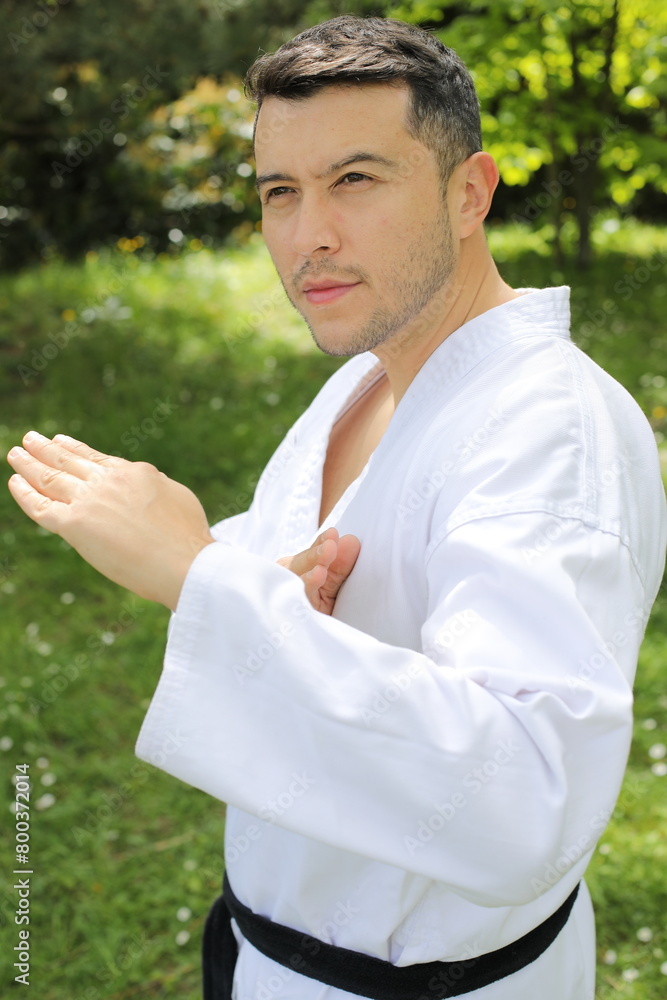 Sporty man with a kimono posing Sporty man with a kimono posing