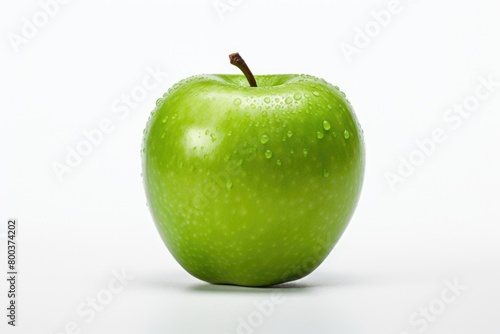 Fresh green apple with water drops isolated on white background. Studio shot.