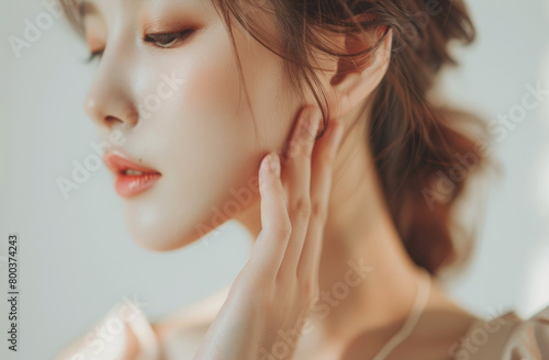 Close up of Korean woman with neck pain, daylight, spa environment, beige , skin care commercial style, beauty advertising shot