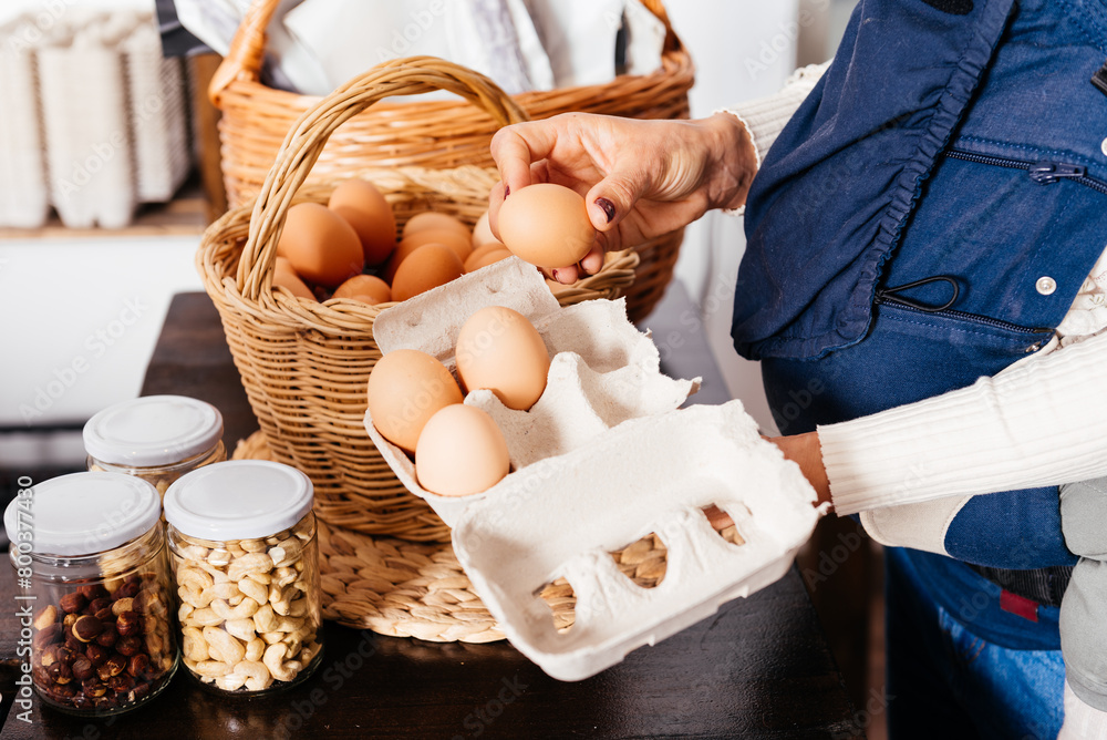 Close-Up of Woman Purchasing Free Range Eggs in Bulk at a Local Farmers Market Close-Up of Woman Purchasing Free Range Eggs in Bulk at a Local Farmers Market
