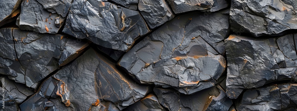 Abstract black cracked earth texture, natural pattern of cracked, dry stone Abstract black cracked earth texture, natural pattern of cracked, dry stone