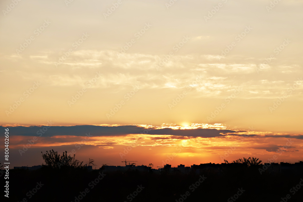 Evening sky with dramatic clouds at sunset. Stunning sunset. Evening sky with dramatic clouds at sunset. Stunning sunset.