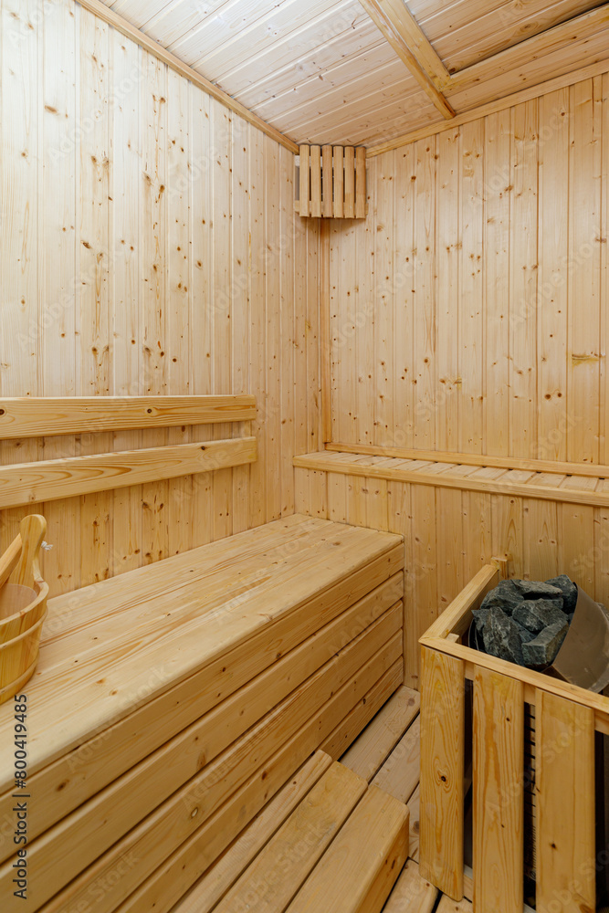 Small home wooden sauna, spa room. Relax in a hot sauna. Small home wooden sauna, spa room. Relax in a hot sauna.