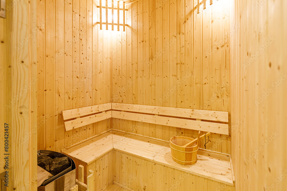 Small home wooden sauna, spa room. Relax in a hot sauna. Small home wooden sauna, spa room. Relax in a hot sauna.