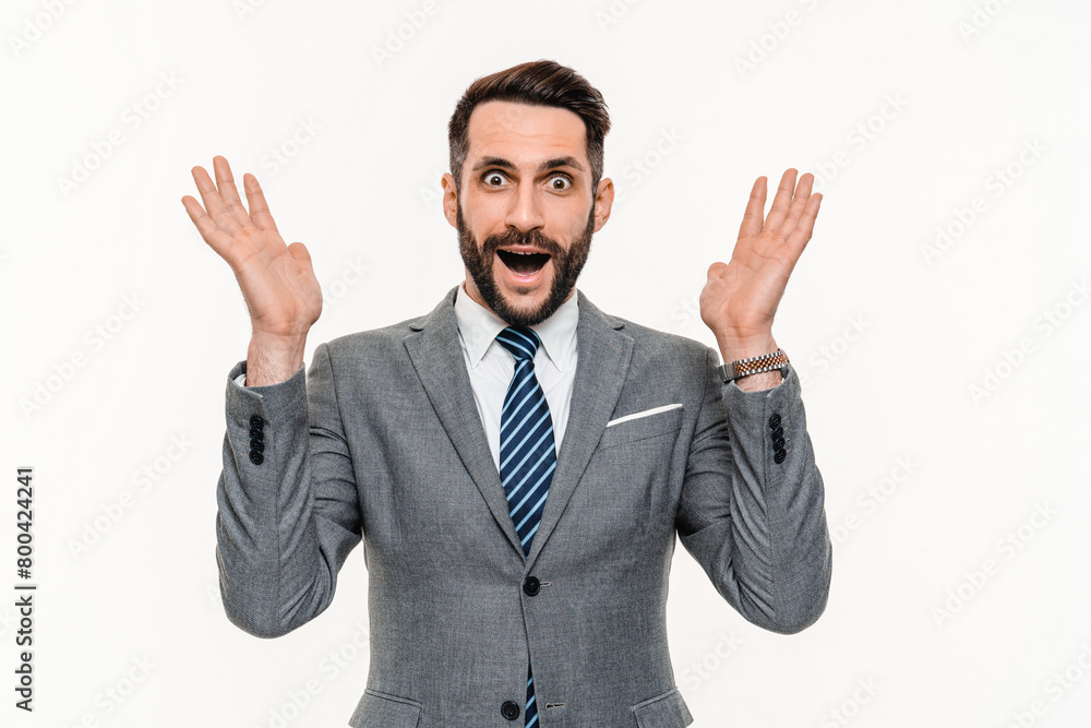 Cheerful Caucasian manager expressing happiness because of winning isolated over white background. Amazed impressed businessman shouting of sale discount offer Cheerful Caucasian manager expressing happiness because of winning isolated over white background. Amazed impressed businessman shouting of sale discount offer