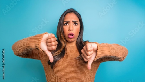 shocked impressed woman dressed sweater getting dislikes modern blue color background 