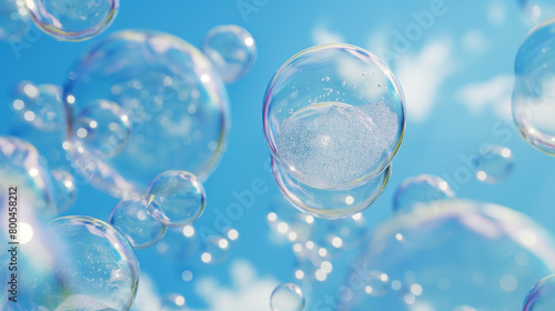 Myriad of transparent soap bubbles floating against a clear blue sky, close-up view