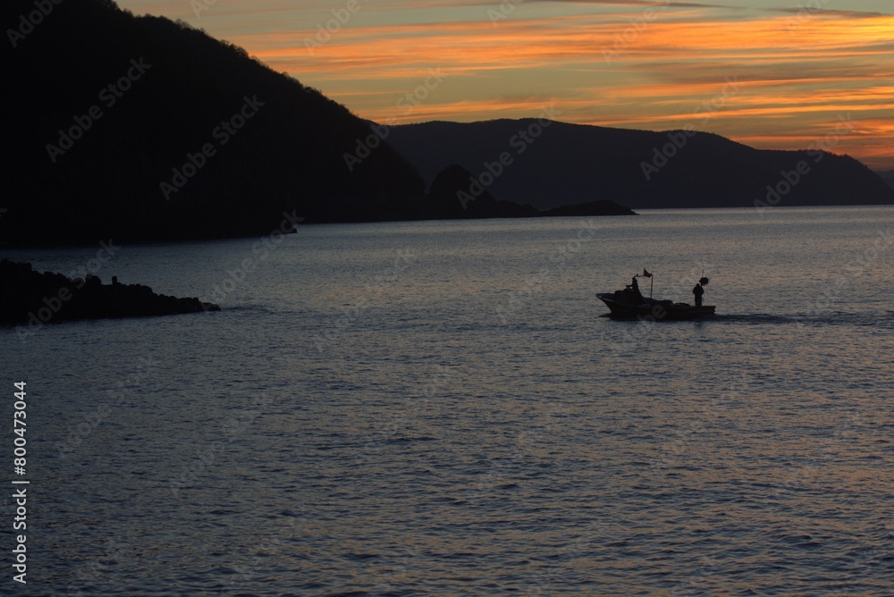 fishing boat in the sunset