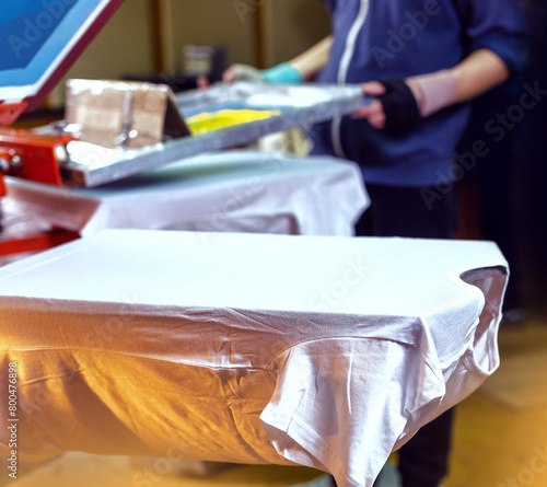 manual screen printing. silkscreen printing production. silk screen textile printery