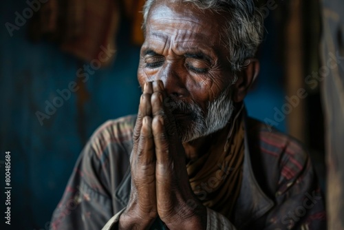 Devout Man in Prayerful Contemplation Seeking Spiritual Guidance and Inner Peace