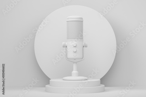 Studio condenser microphone on cylinder podium with step on monochrome