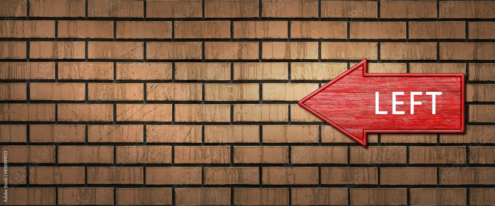 Red wooden arrow sign with the word LEFT hanging on a dark brick wall. Left arrow pointer Red wooden arrow sign with the word LEFT hanging on a dark brick wall. Left arrow pointer
