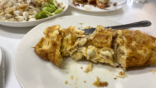 Michelin star Crab omelette from Nhong Rim Klong, eggs and crab fried rice photo