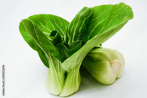 Pak chai, chinese cabbage cut into pieces on white background