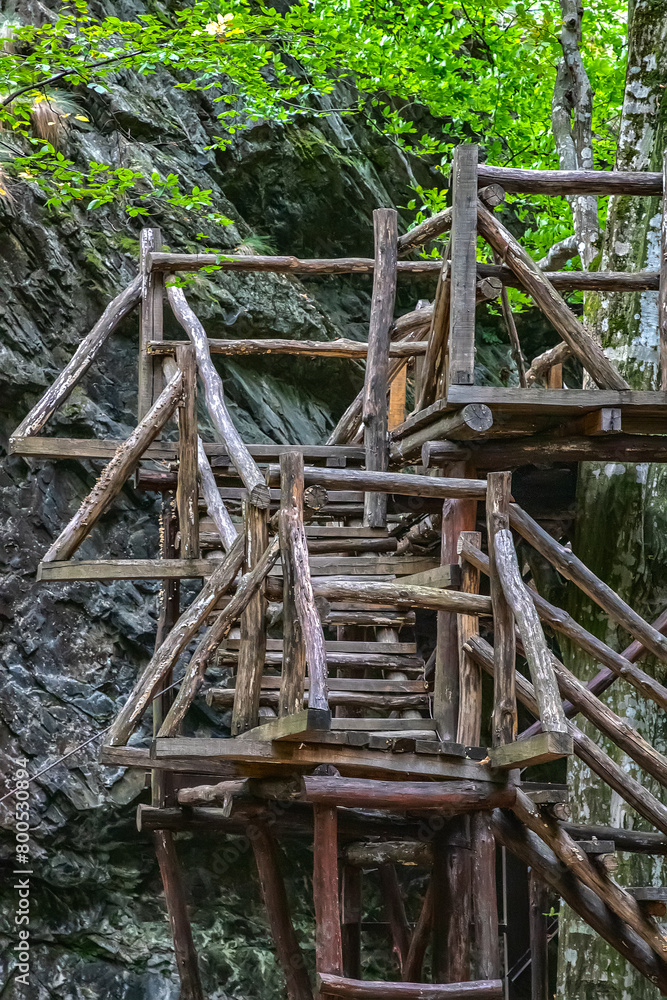 Beautiful wooden hand-made bridge in the eco path. Beautiful wooden hand-made bridge in the eco path.