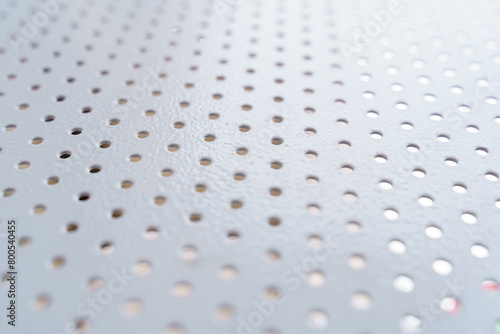 Close Up of Metal Surface With Holes