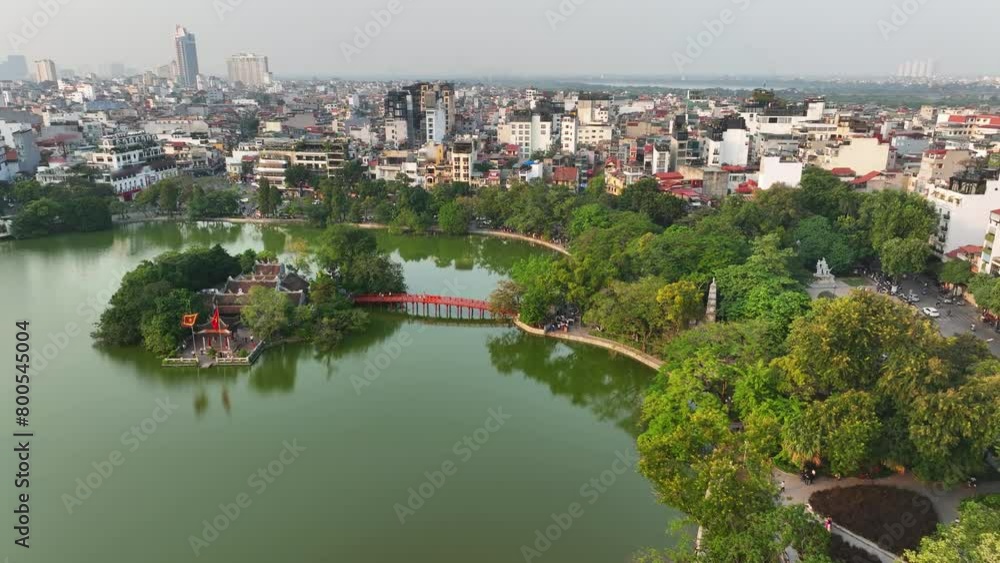 Hoan Kiem lake aerial drone view with ancient Ngoc Son temple and The Huc bridge in Hanoi, Vietnam Hoan Kiem lake aerial drone view with ancient Ngoc Son temple and The Huc bridge in Hanoi, Vietnam