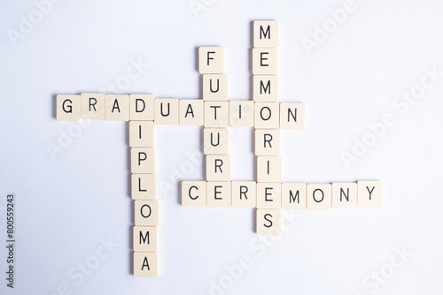 Crossword puzzle on the theme Graduation, isolated letters on a white background.