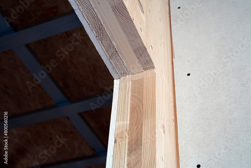 We see a detail of a massive building panel. It is solid dry wood.