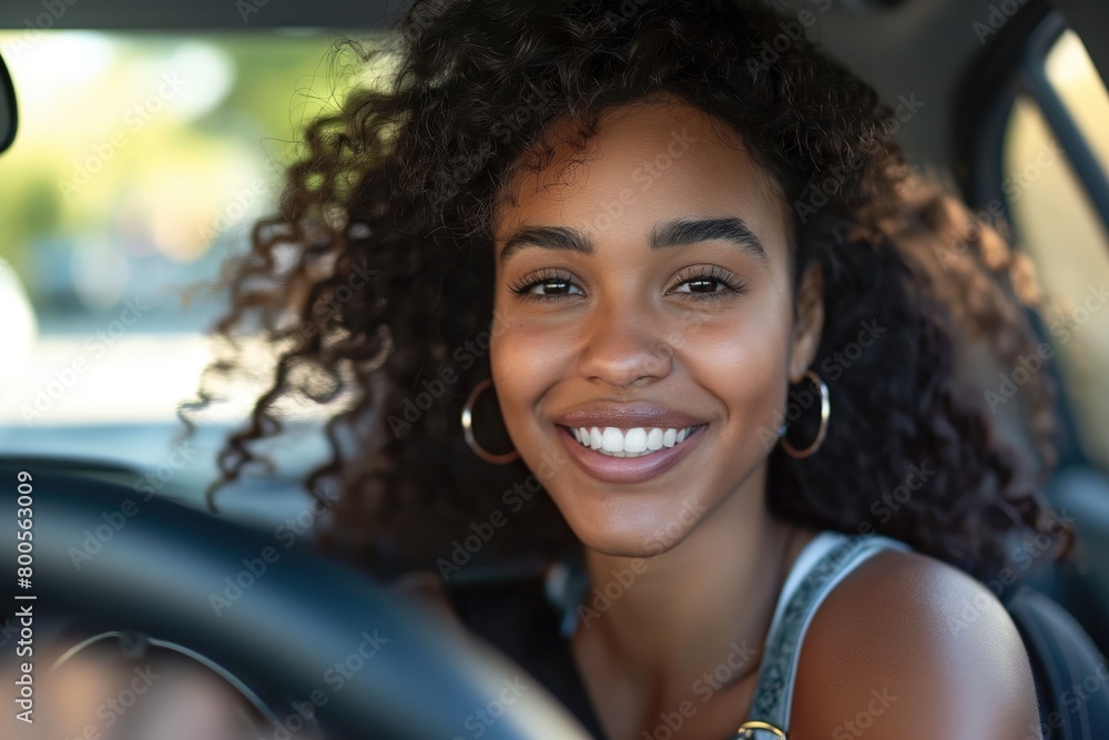 Close up portrait of a beautiful young woman smiling while driving a car Close up portrait of a beautiful young woman smiling while driving a car