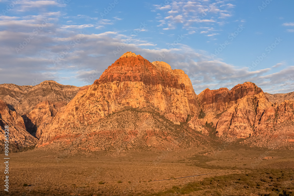 Naklejka premium Scenic sunrise view of limestone peaks Mount Wilson, Bridge and Rainbow Mountain of Red Rock Canyon National Conservation Area in Mojave Desert near Las Vegas, Nevada, United States. Remote hiking