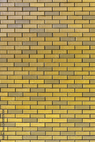 Yellow Brick wall. Construction abstract background.