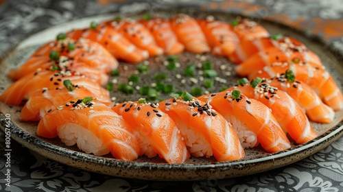  A black and white sushi plate is placed on a table with the same color cloth