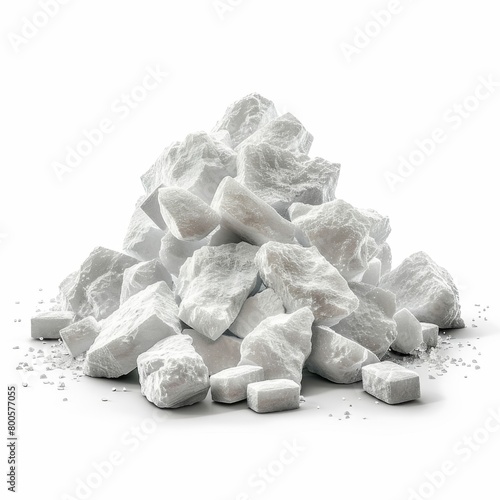 a pile of sugar cubes and crushed sugar on a white background photo