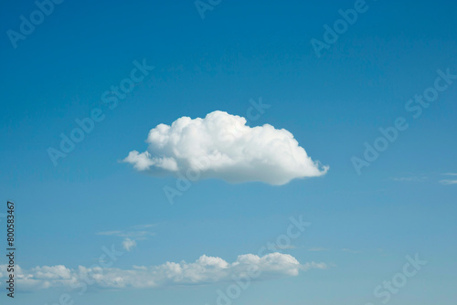 A single bright cloud in a clear sky  symbolizing the optimism and vision required in leadership 