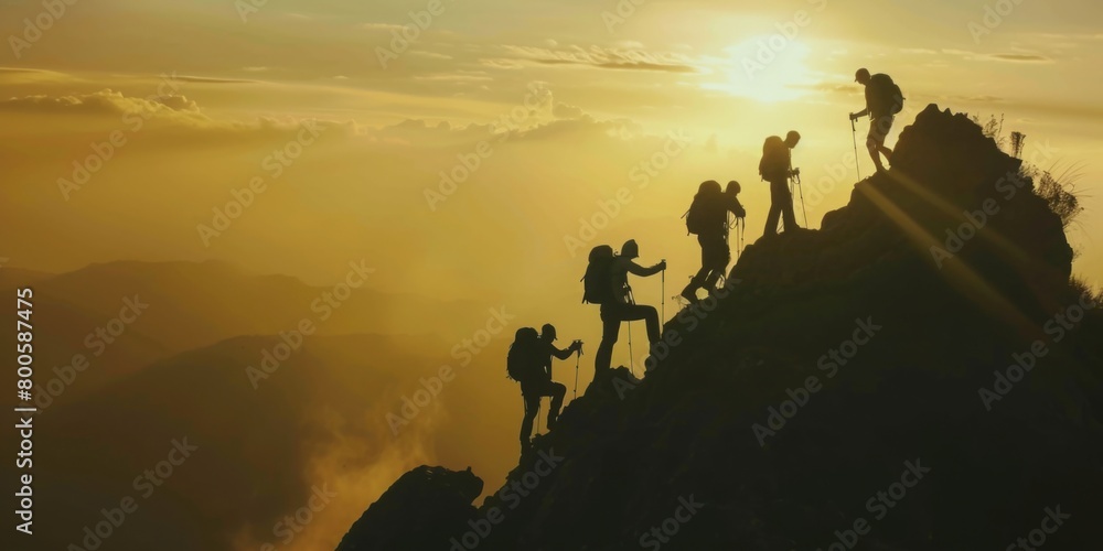 Fototapeta premium Silhouette of people hiking to top of the mountain climbers.
