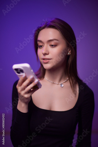 Young beautiful smart woman over purple isolated background happy face smiling Positive person.