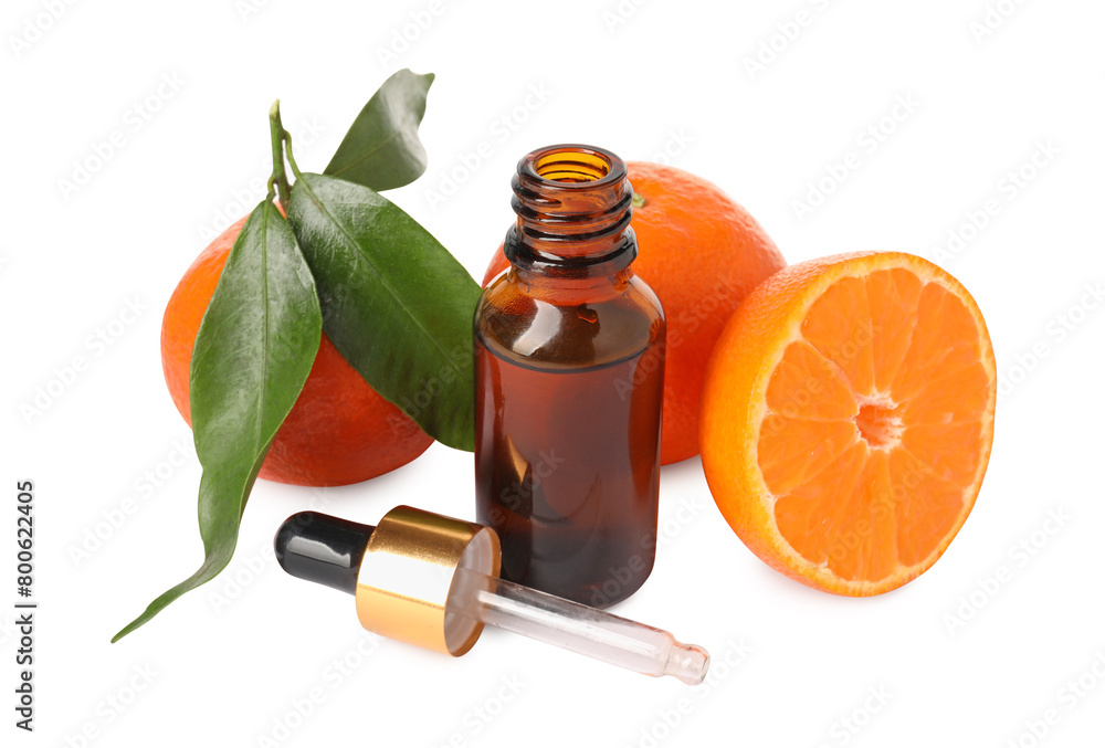 Aromatic tangerine essential oil in bottle, pipette and citrus fruits isolated on white Aromatic tangerine essential oil in bottle, pipette and citrus fruits isolated on white