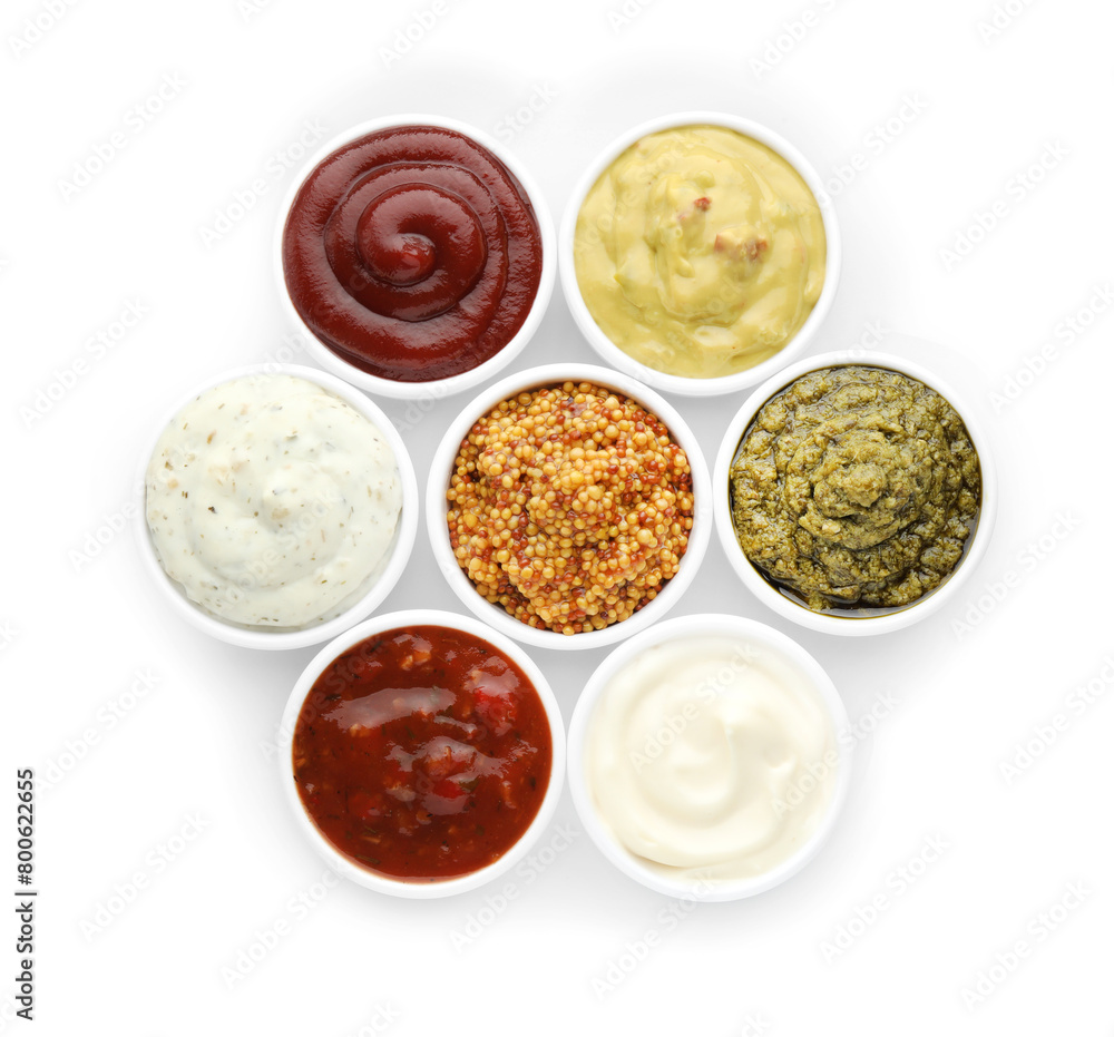 Many different sauces in bowls on white background, top view Many different sauces in bowls on white background, top view